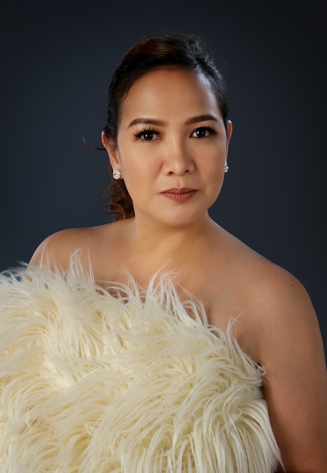 Portrait of Faye Young, bridal makeup artist and founder of Makeup Academy Manila Inc.