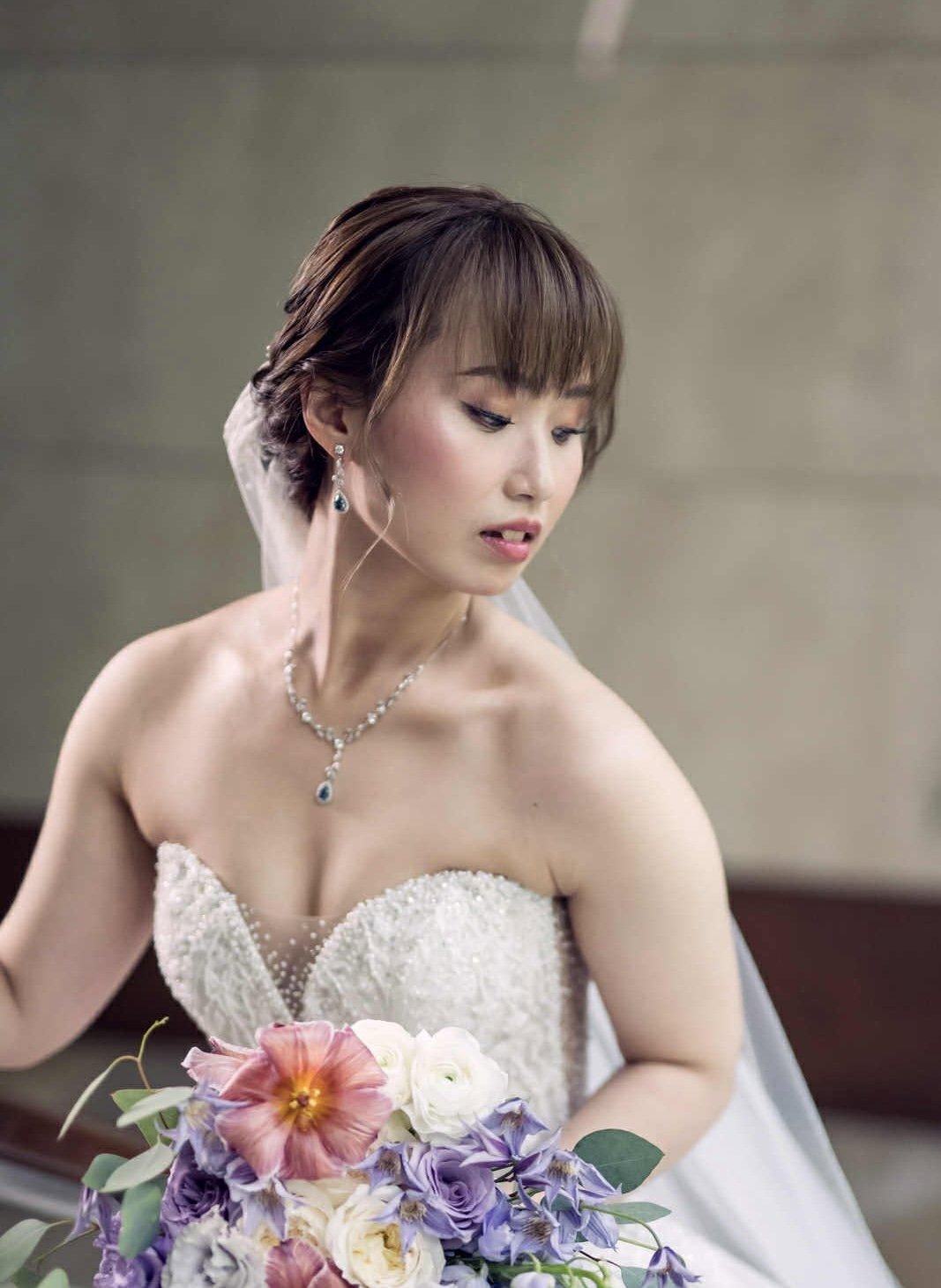Bride with dewy airbrush skin and a soft rose lip.